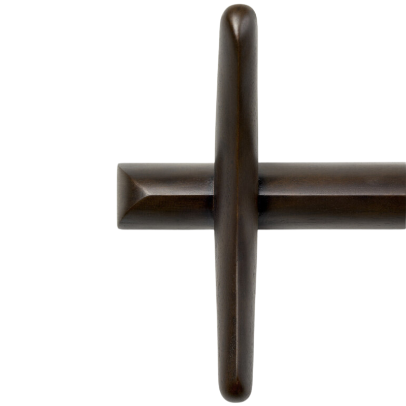 The dark brown mahogany PI Wall Coat Rack Mahogany by Ethnicraft focusing on the hanger.