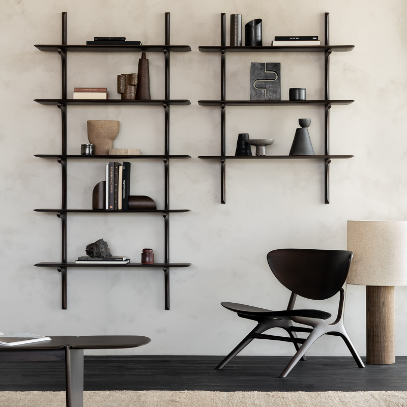The PI Wall Shelf with Three Shelves from Ethnicraft in a living room.