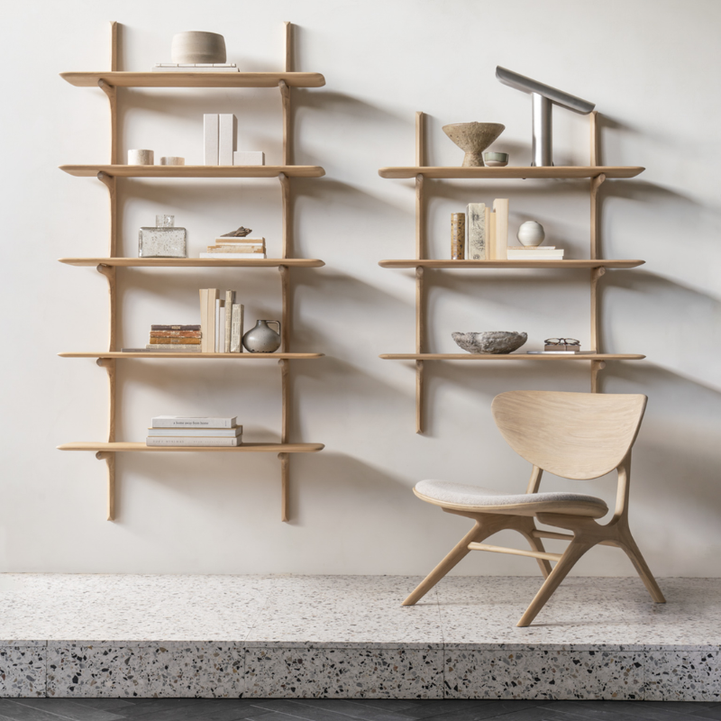 The PI Wall Shelf with Three Shelves from Ethnicraft in a living space.