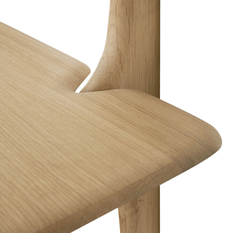 The PI Wall Shelf with Two Shelves from Ethnicraft in oak focusing on the shelf.