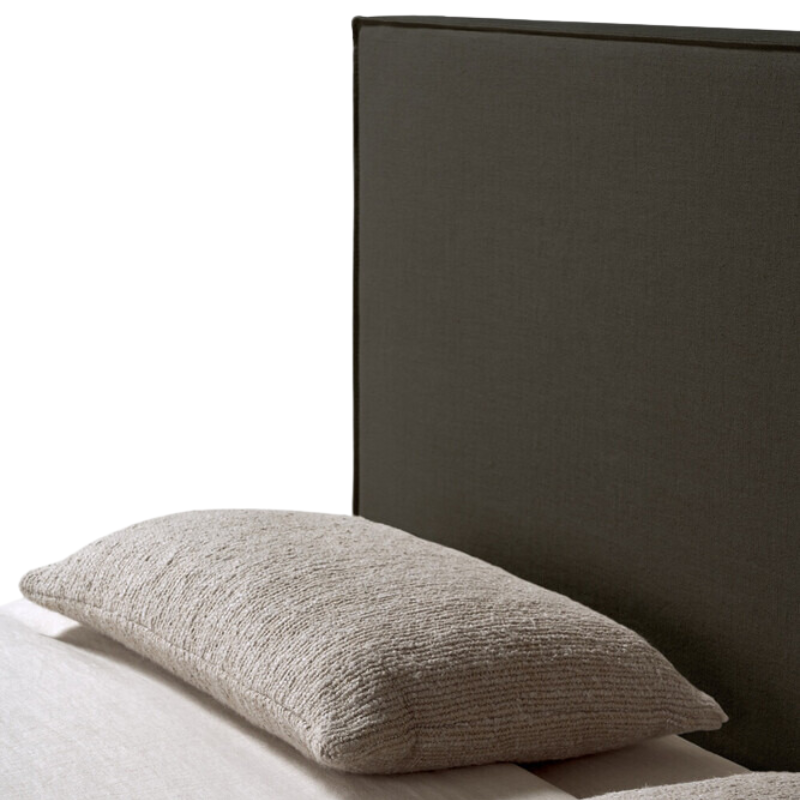 The Revive Bed from Ethnicraft in grey color headboard.