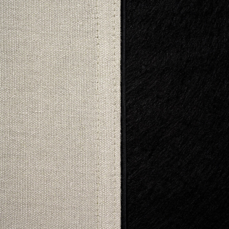 The Revive Bed from Ethnicraft in sand color cover.