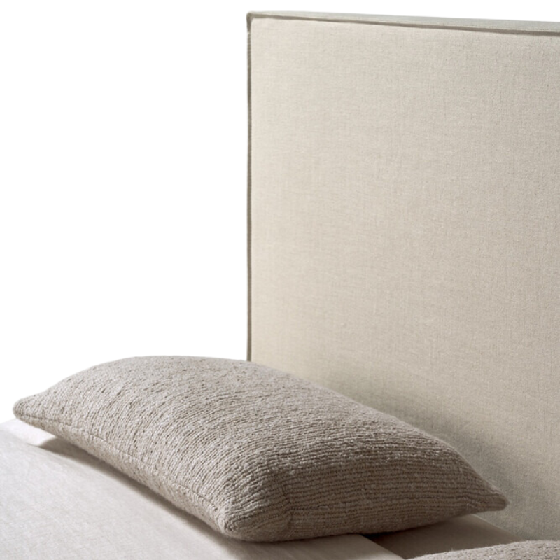 The Revive Bed from Ethnicraft in sand color headboard.