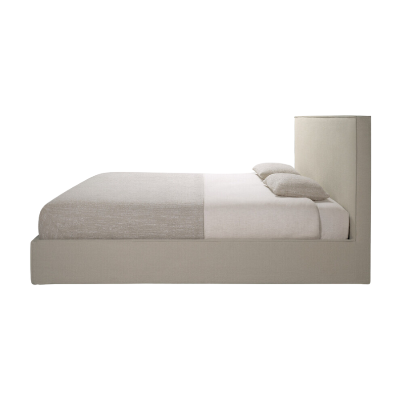 The Revive Bed from Ethnicraft in sand color from the side.