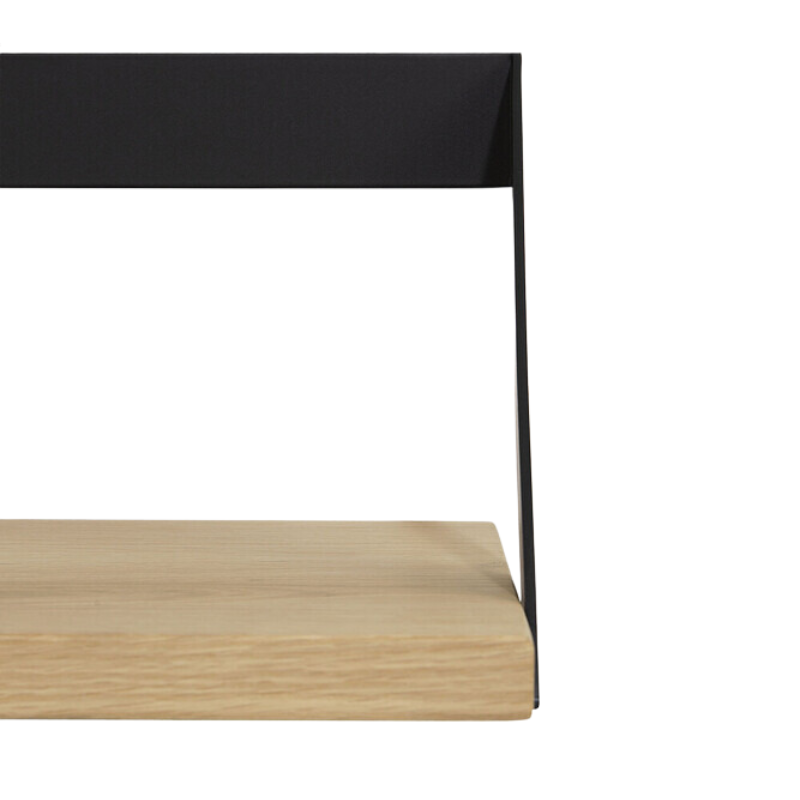 The Ribbon Shelf from Ethnicraft made with oak wood and black metal corner.