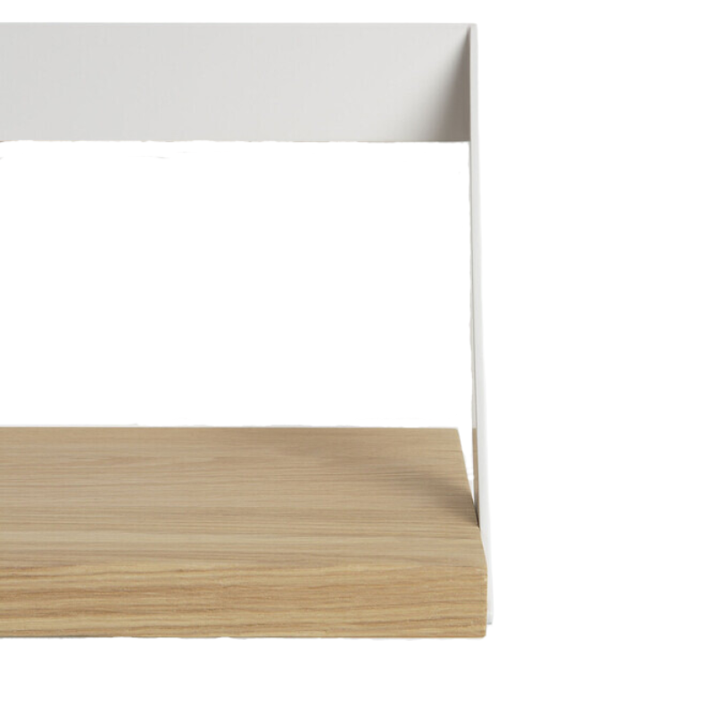 The Ribbon Shelf from Ethnicraft made with oak wood and white metal corner.