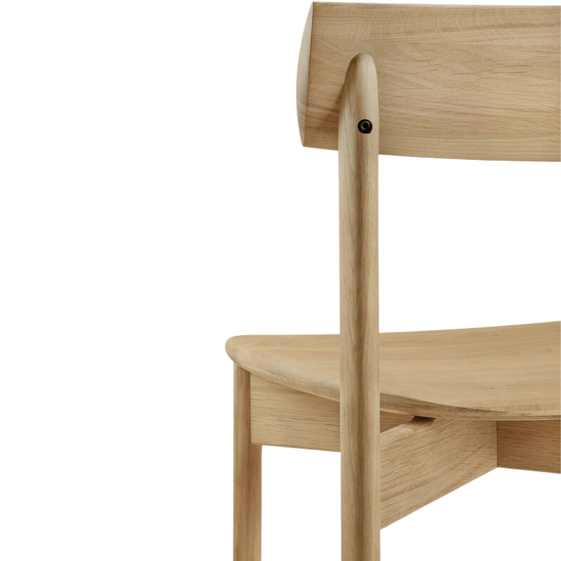 The back of the Risu Dining Chair by Ethnicraft shows woodwork in detail.