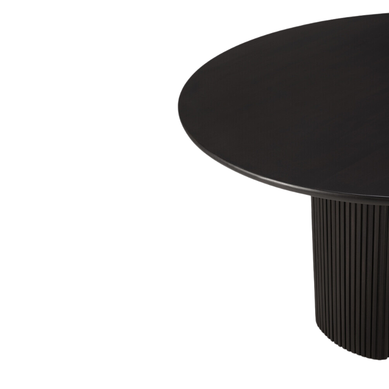 The Roller Max Dining Table from Ethnicraft focusing on the round table top.