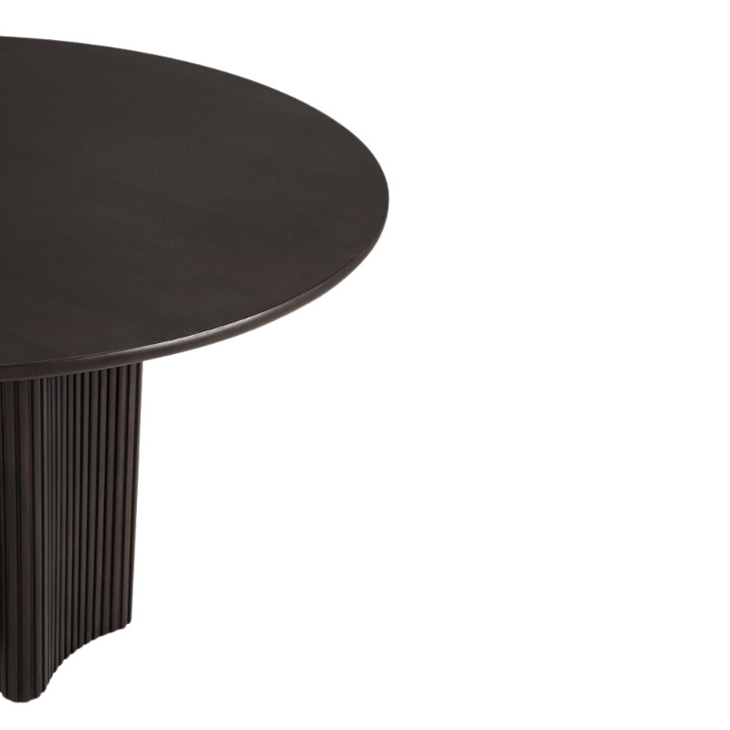 The Roller Max Dining Table from Ethnicraft focusing on one side.