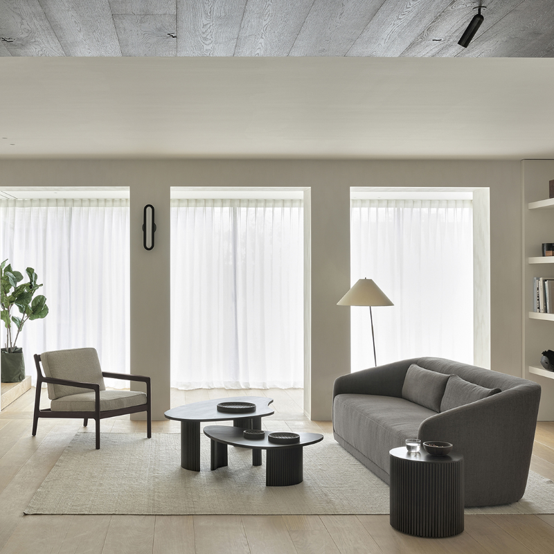 The Roller Max Side Table from Ethnicraft in a family space.