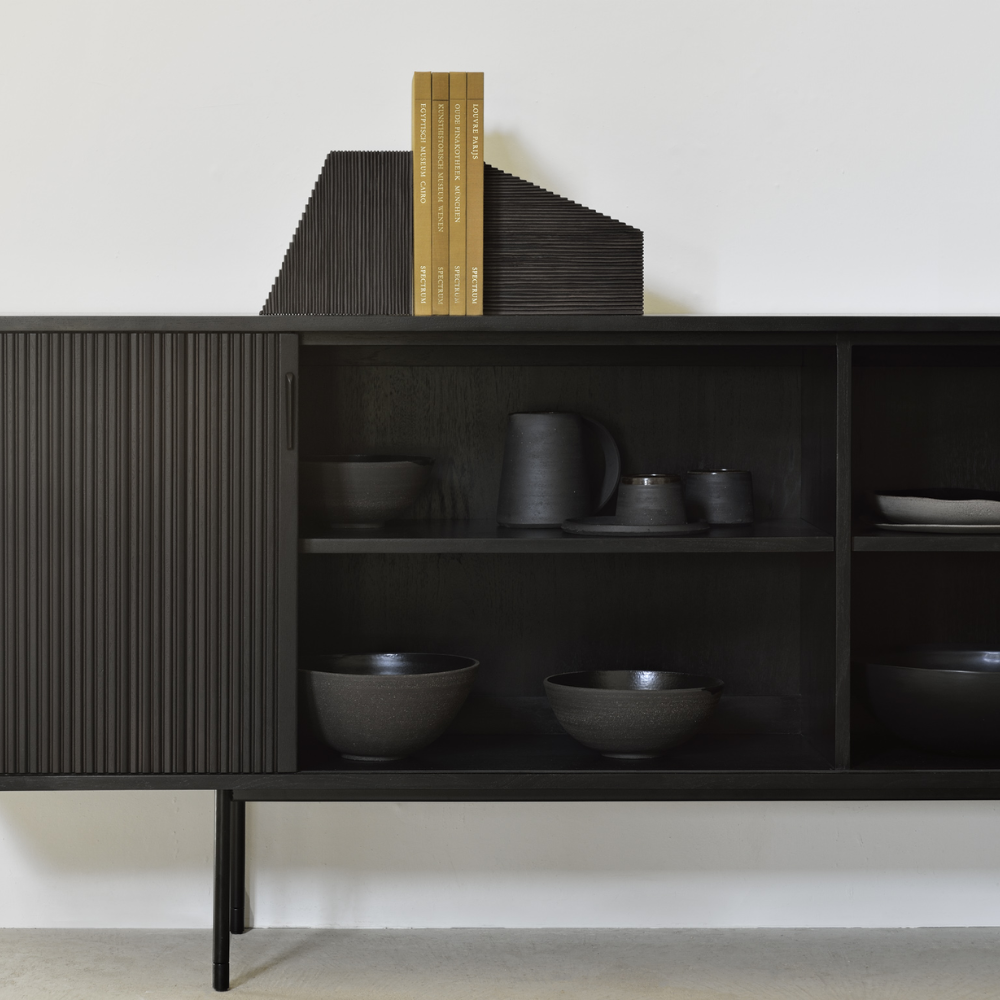 The Roller Max Sideboard from Ethnicraft in teak off black with dished inside.