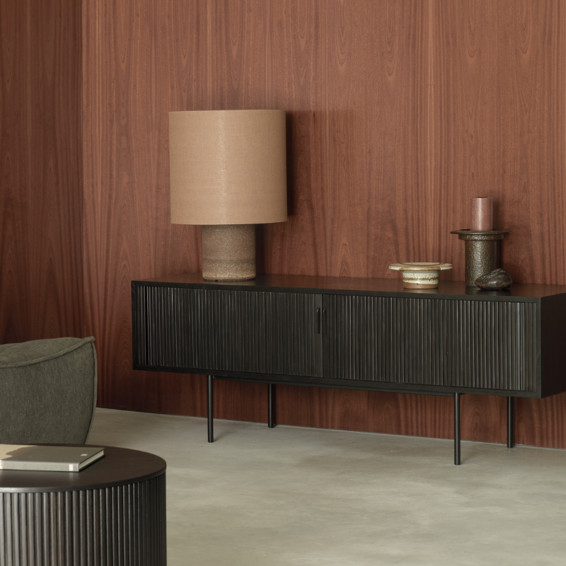 The Roller Max TV Cupboard from Ethnicraft in a living room.