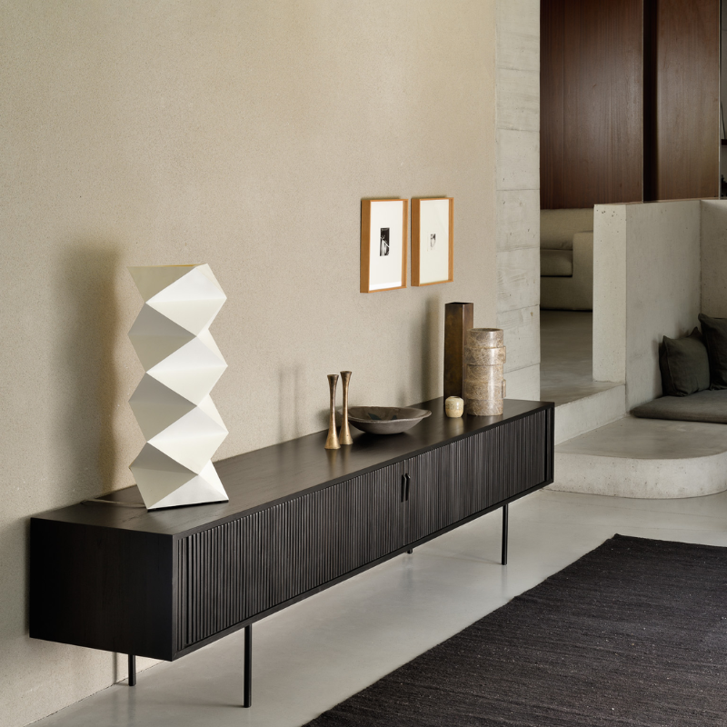 The Roller Max TV Cupboard from Ethnicraft in a lounge.