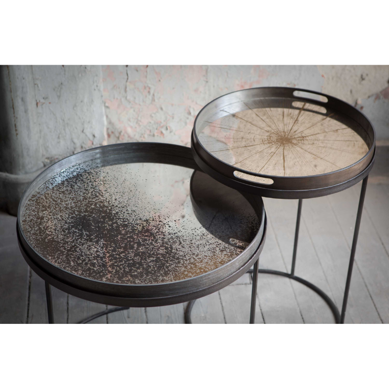 The clear Aged Mirror Tray from Ethnicraft in a business space.