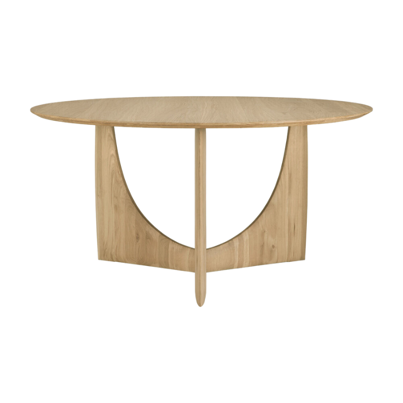 The oak Round Geometric Dining Table from Ethnicraft from the side.