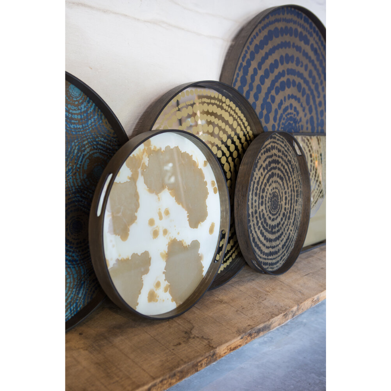 The round gold mist Organic Glass Tray from Ethnicraft with other tray options.