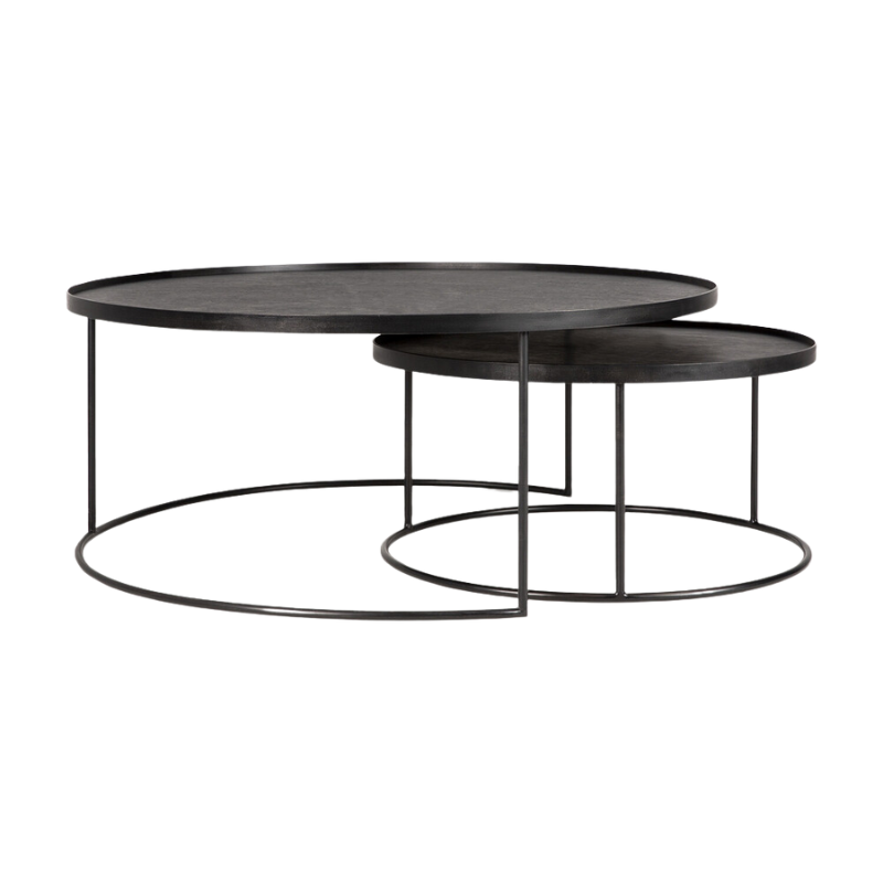 The medium and large Round Tray Coffee Table Set from Ethnicraft used as nesting tables to save space.