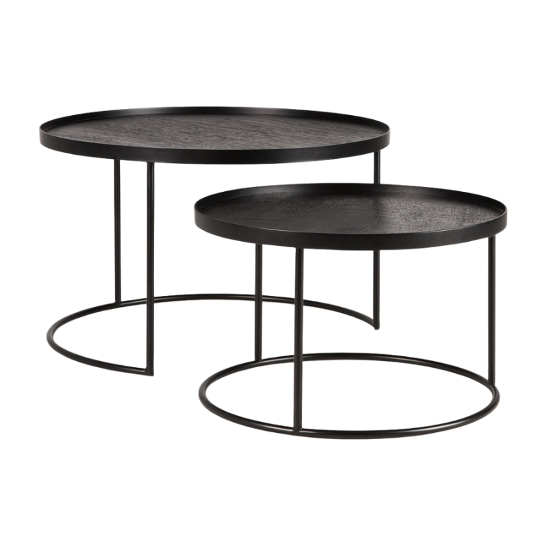 The small and medium Round Tray Coffee Table Set from Ethnicraft in a studio.