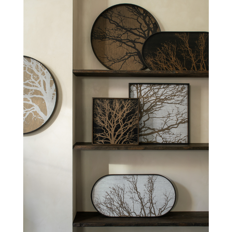 The white Tree Wooden Tray from Ethnicraft in a collection of trays.