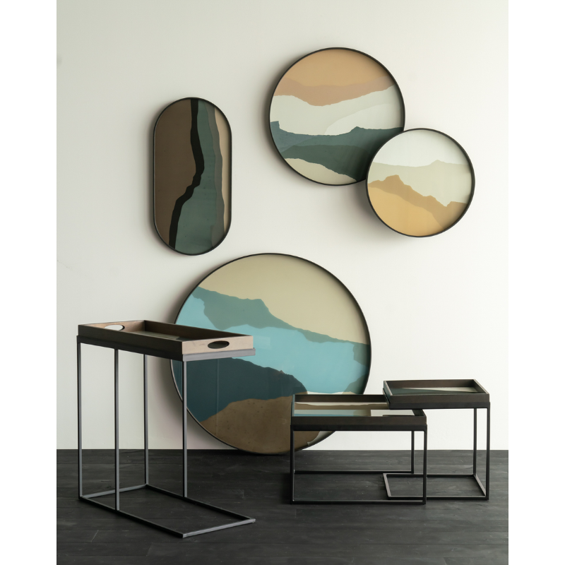 The round Wabi Sabi Glass Tray from Ethnicraft options in a family area.