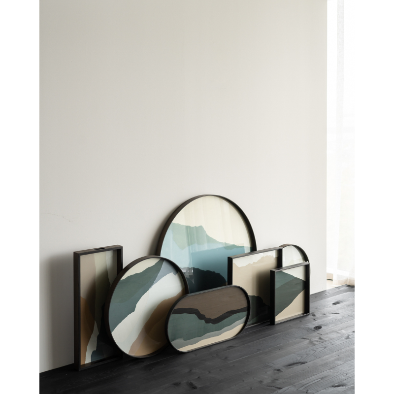 The round Wabi Sabi Glass Tray from Ethnicraft in a living room with other Wabi Sabi trays. all-groups