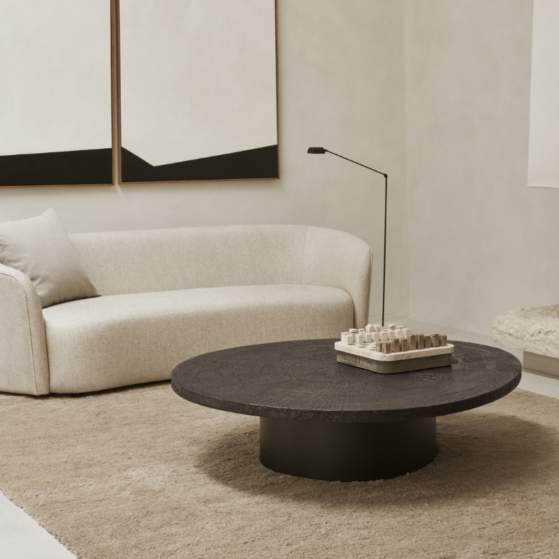 The 54.5 inch Slice Coffee Table from Ethnicraft in a living room.