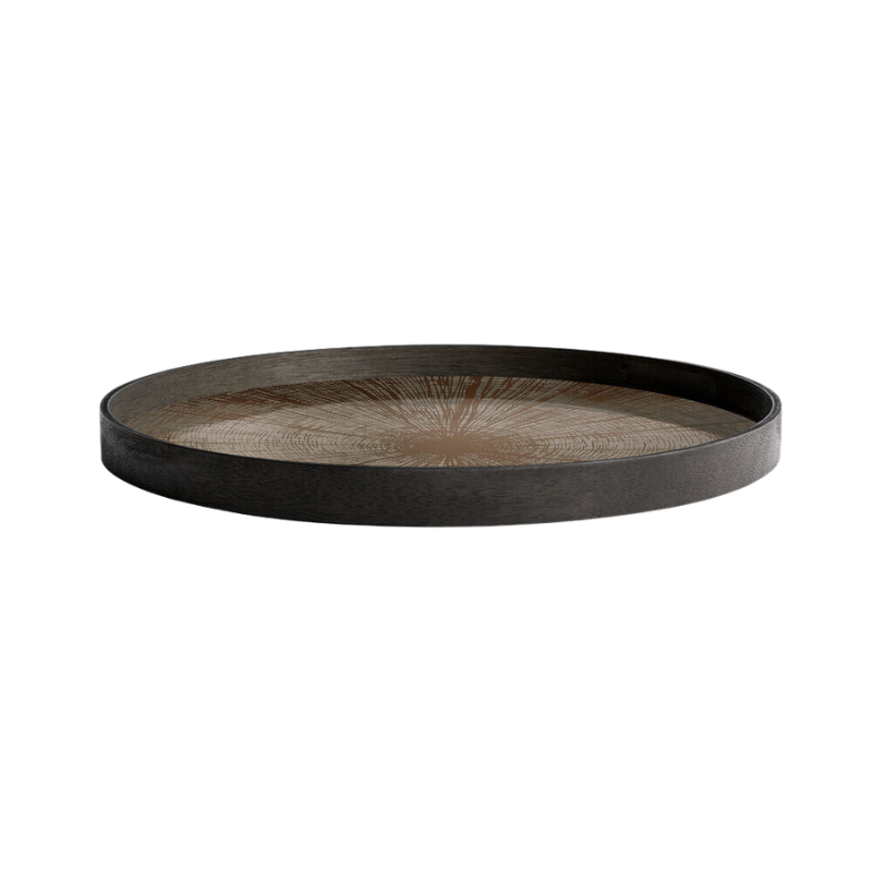 The large round Slice Mirror Tray from Ethnicraft from the side.