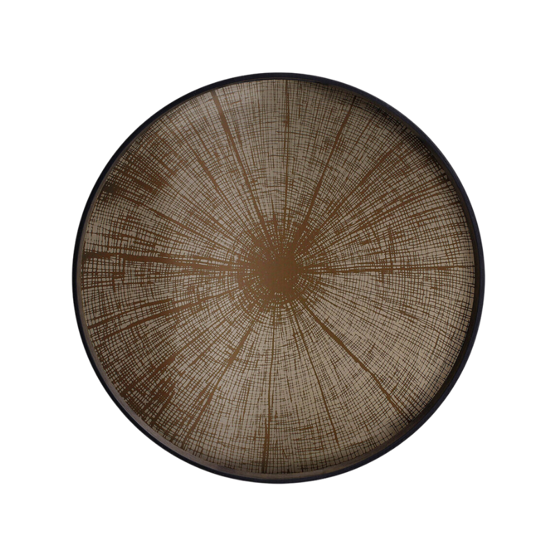 The large round Slice Mirror Tray from Ethnicraft.