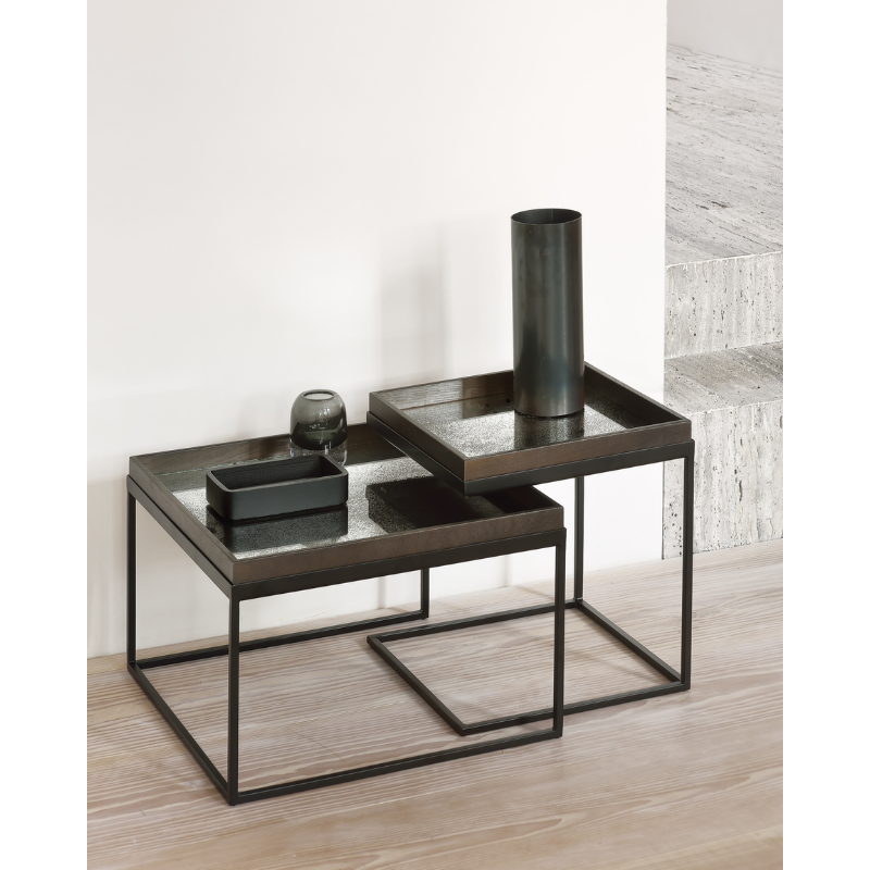 The small and medium square Tray Coffee Table Set from Ethnicraft in an entryway.