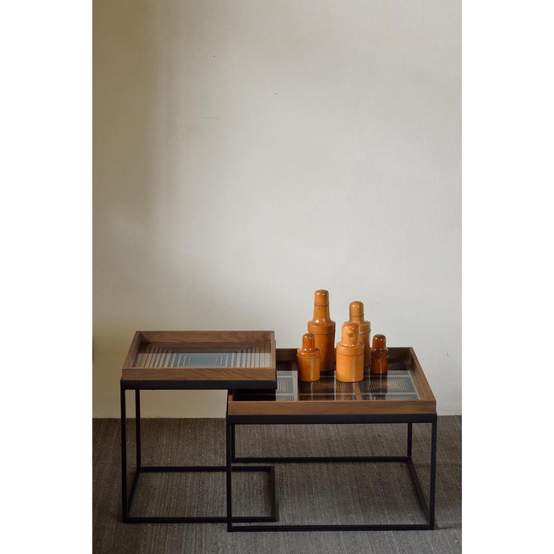 The small and medium square Tray Coffee Table Set from Ethnicraft in a family space.