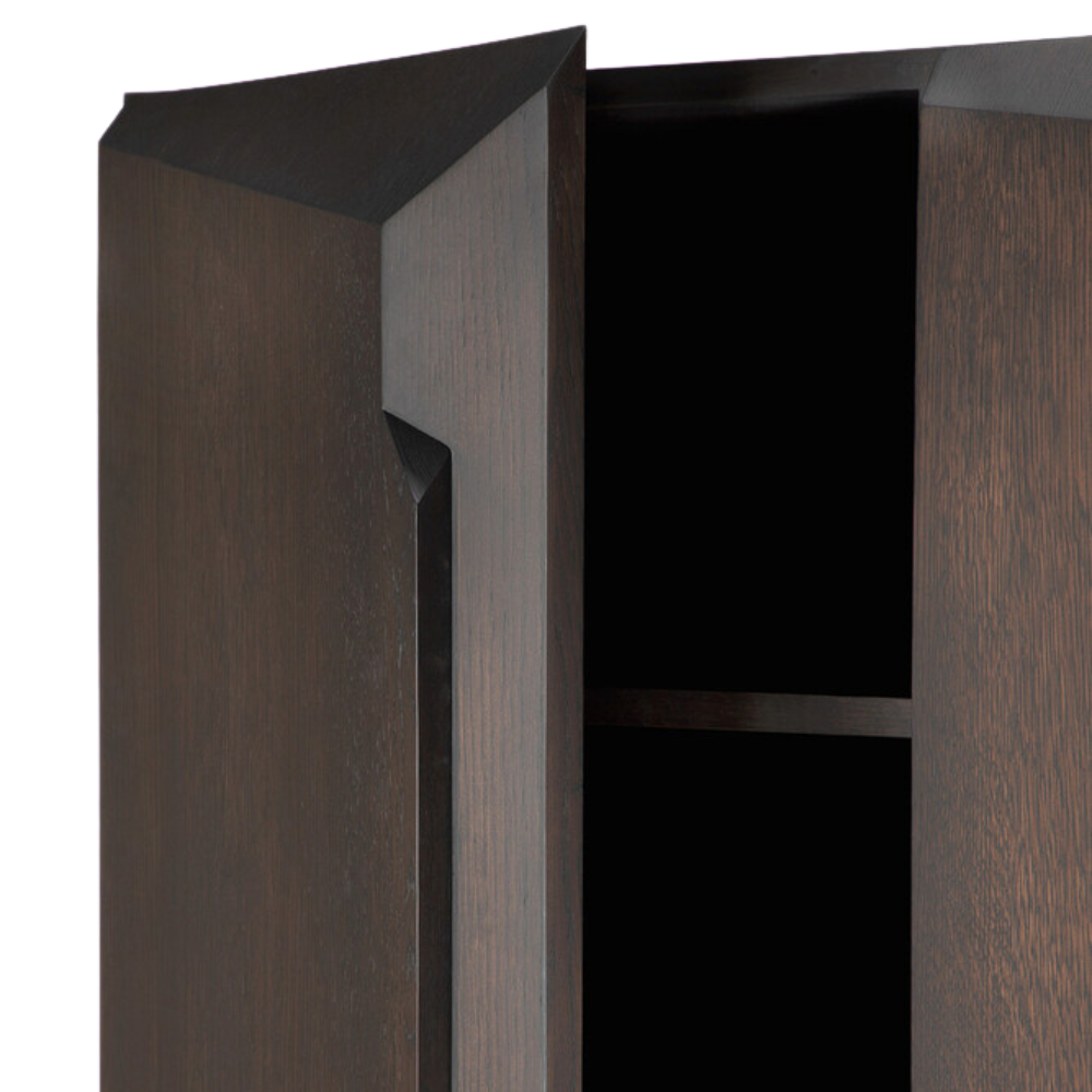 The Stairs Cupboard from Ethnicraft with the door open, close-up, focusing on the storage.