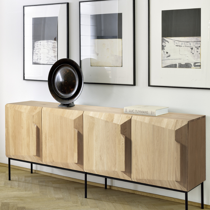 The Stairs Sideboard from Ethnicraft in a lounge.