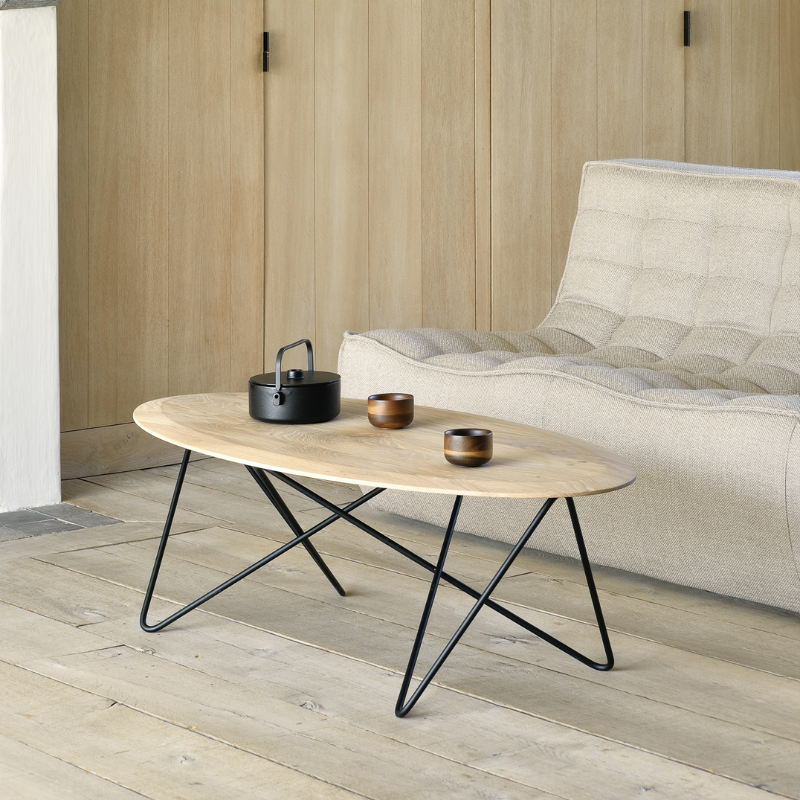 The N701 Three Seater Sofa from Ethnicraft with beige standard fabric in a living space.