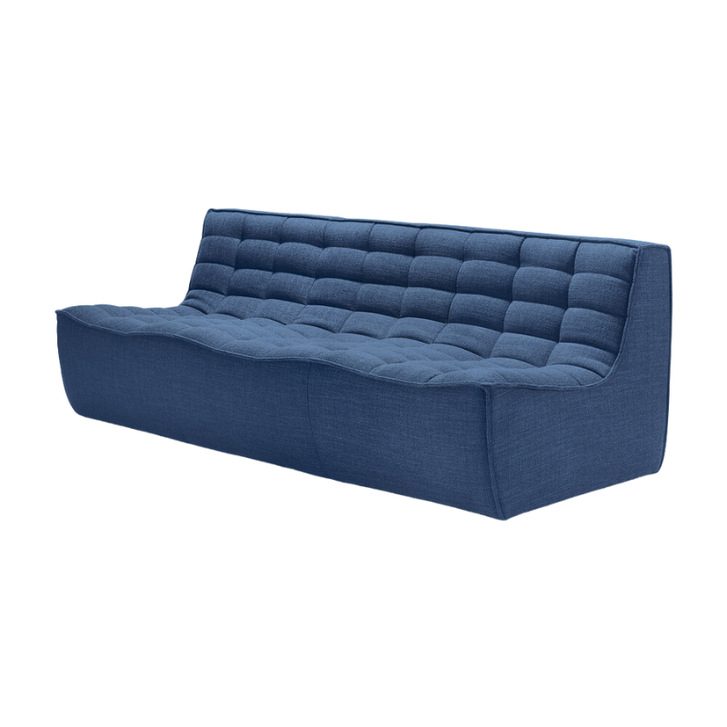 The N701 Three Seater Sofa from Ethnicraft with blue standard fabric from an angle.