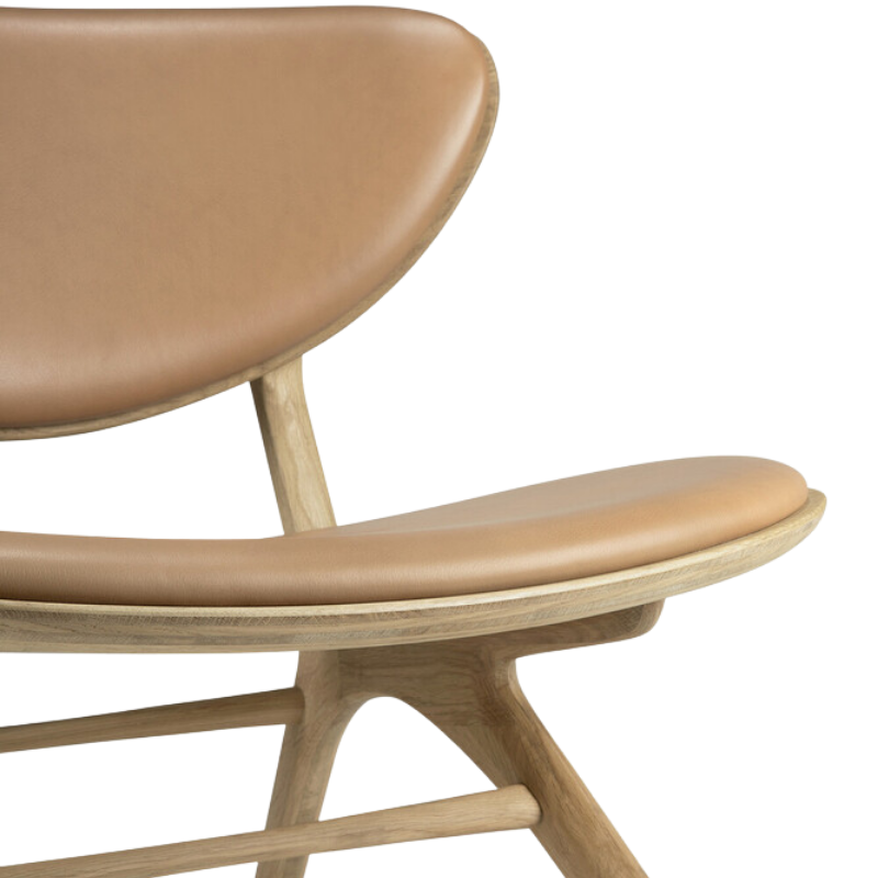 The Upholstered Eye Lounge Leather Chair by Ethnicraft in detail of seat.