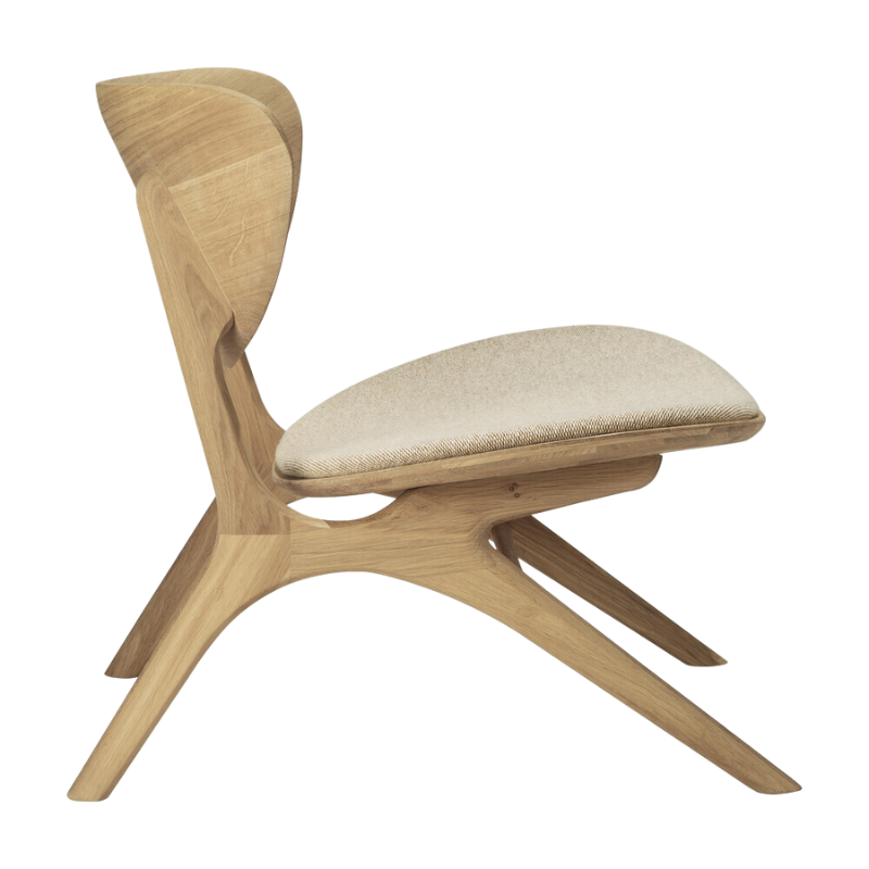 The Upholstered Eye Lounge Chair by Ethnicraft from the side.