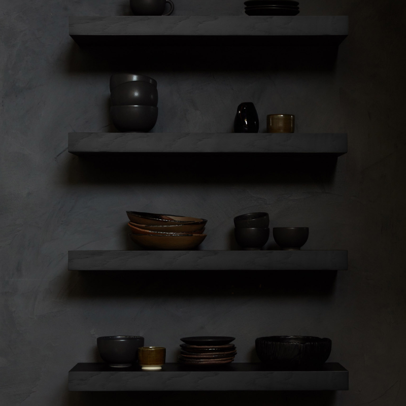 The Wall Shelf from Ethnicraft made with black oak in a home.