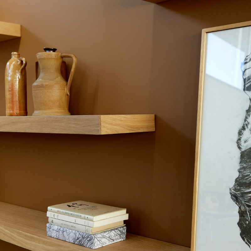 The Wall Shelf from Ethnicraft made with oak in an office.