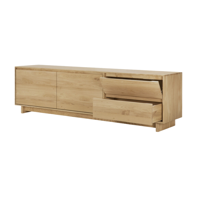 The Wave TV Cupboard from Ethnicraft with open drawers.
