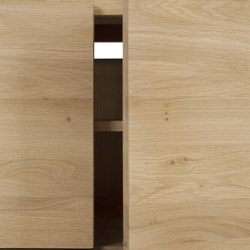 The Wave TV Cupboard from Ethnicraft highlighting the storage.