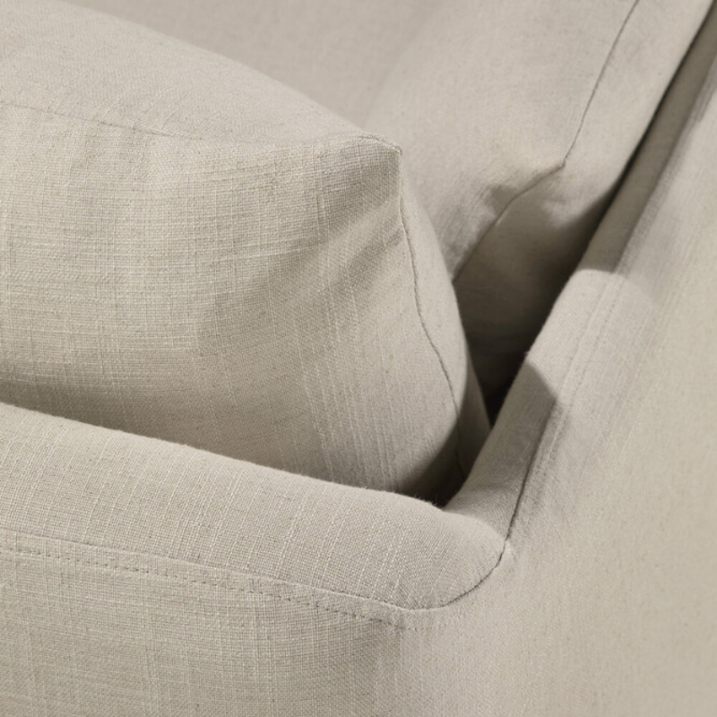 The bone Weave Lounge Chair by Ethnicraft features fabric details on top.