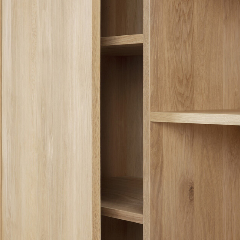 The Whitebird Cupboard from Ethnicraft focusing on the storage.