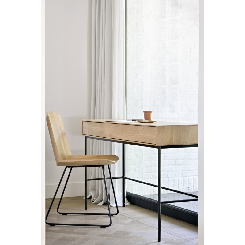 The Whitebird Desk from Ethnicraft in a home office.