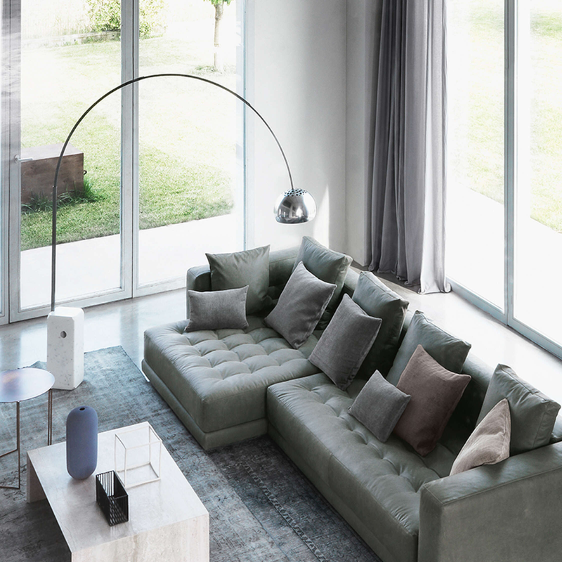 The Arco LED Floor Lamp from FLOS in a living space.
