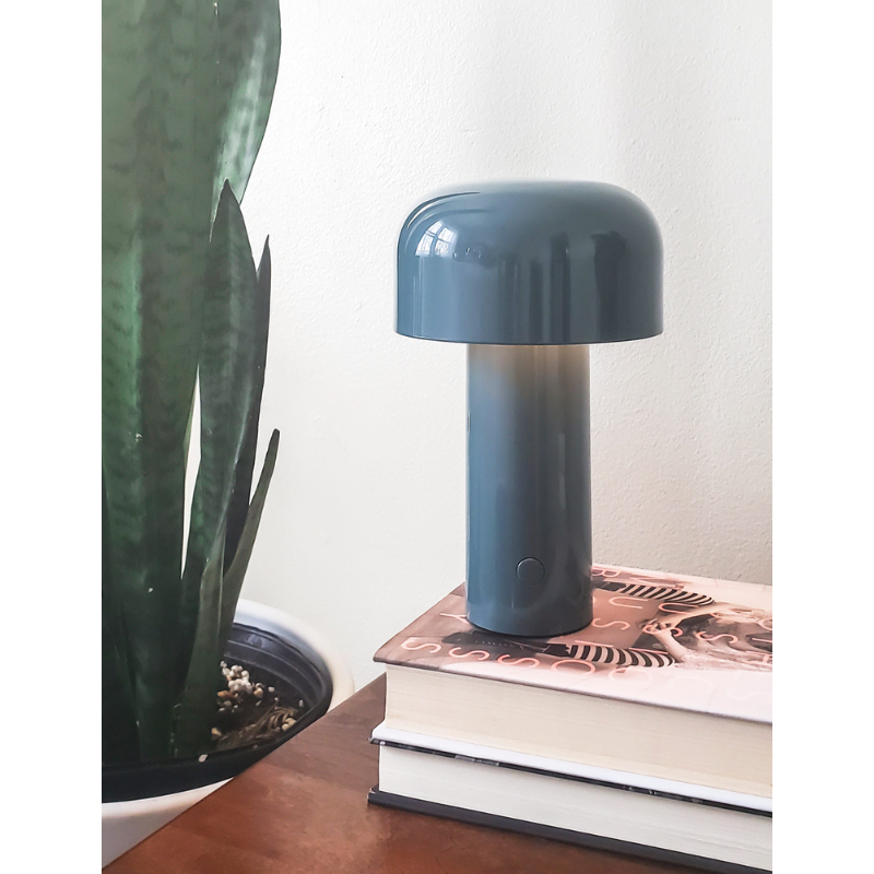The Bellhop Portable Table Lamp from FLOS in a designer home.