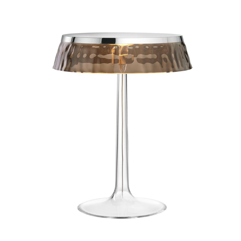 The Bon Jour Table Lamp from Flos in chrome with fumee crown.