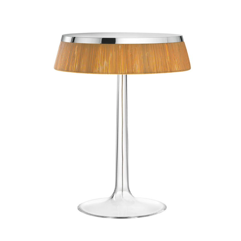 The Bon Jour Table Lamp from Flos in chrome with rattan crown.