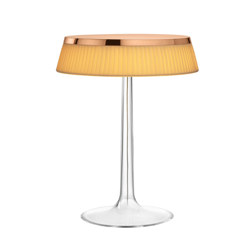The Bon Jour Table Lamp from Flos in copper with plisse cloth crown.