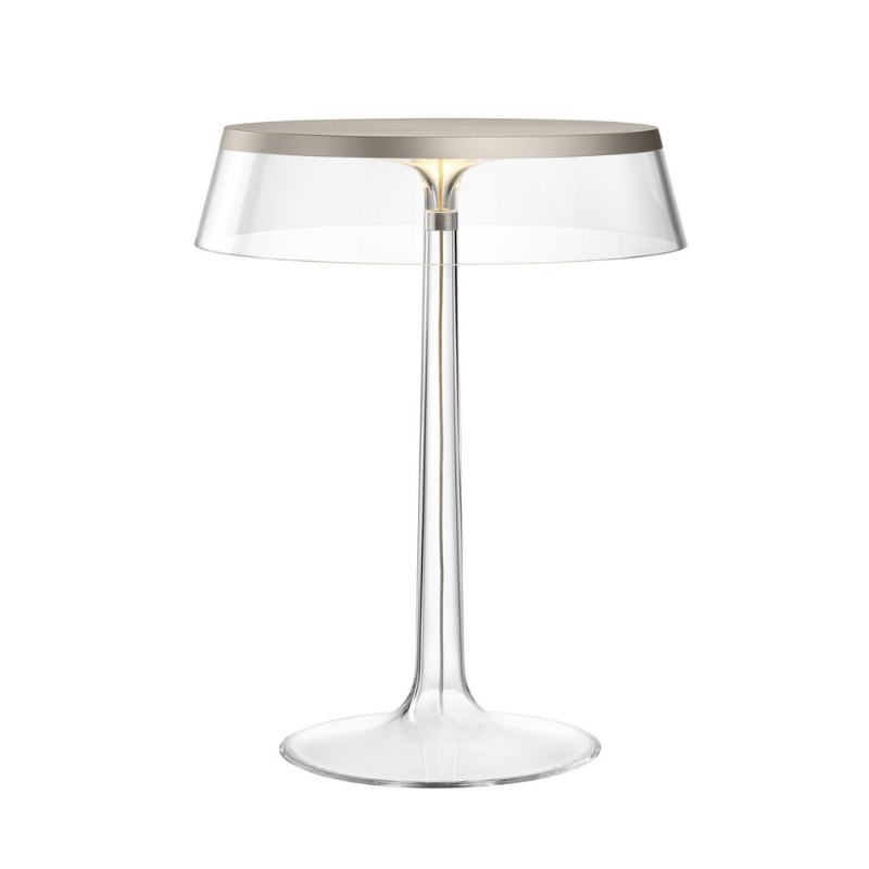 The Bon Jour Table Lamp from Flos in matte chrome with transparent crown.
