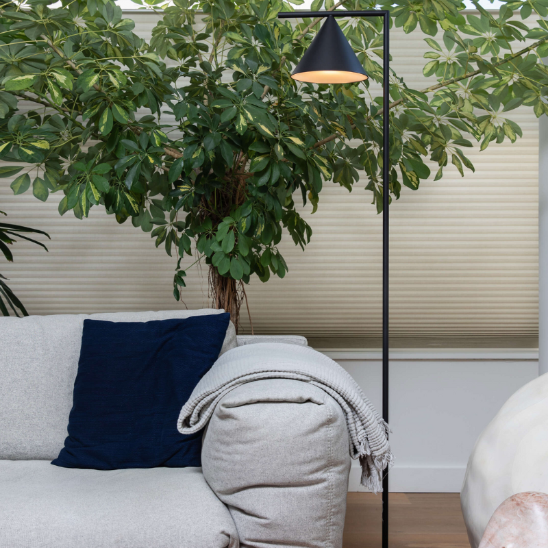 The Captain Fliny Floor Lamp from Flos in a lounge.